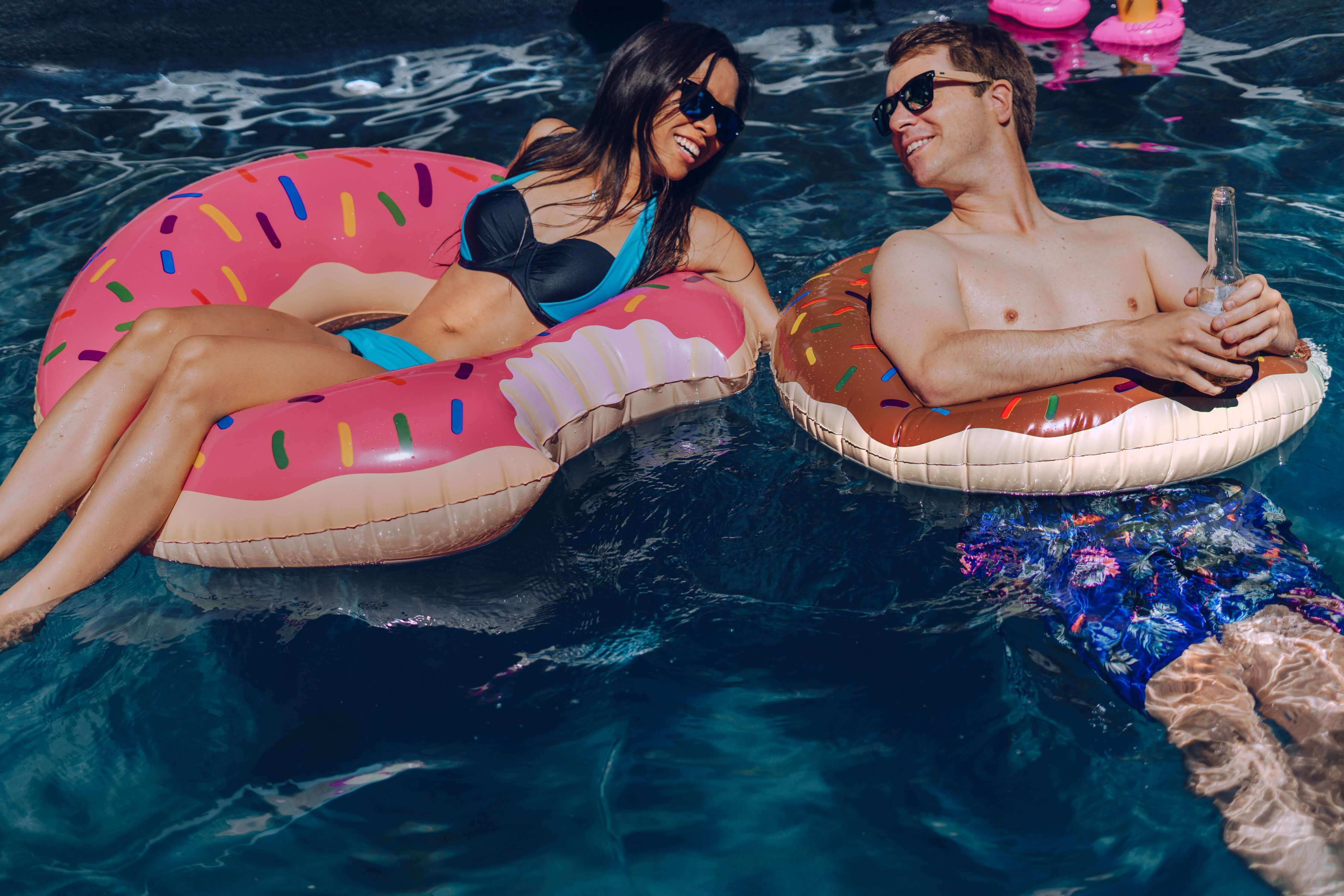 Couple on swimming pool drunked